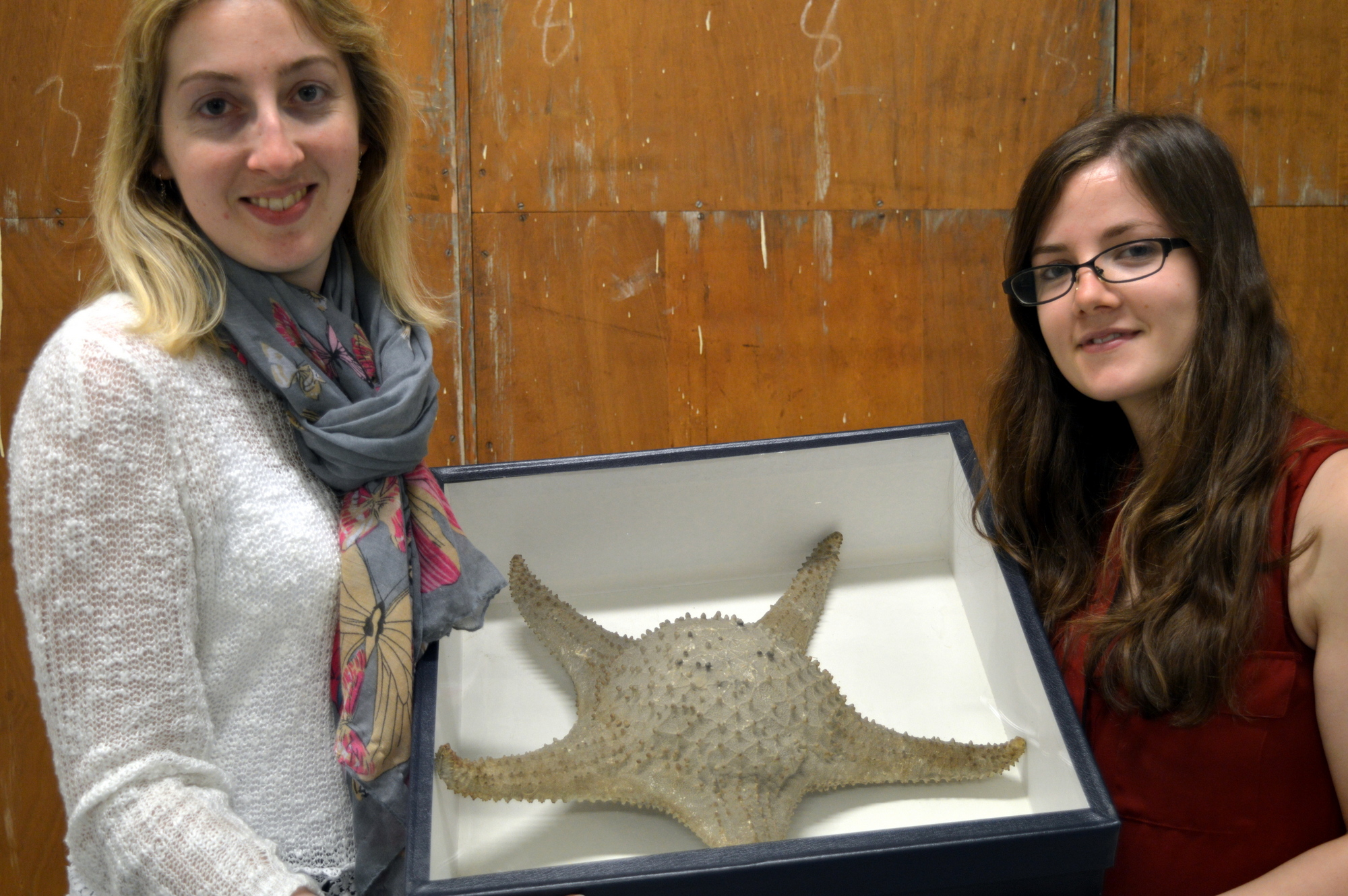 Holly and Heather with a big starfish collected on the Challenger Expedition